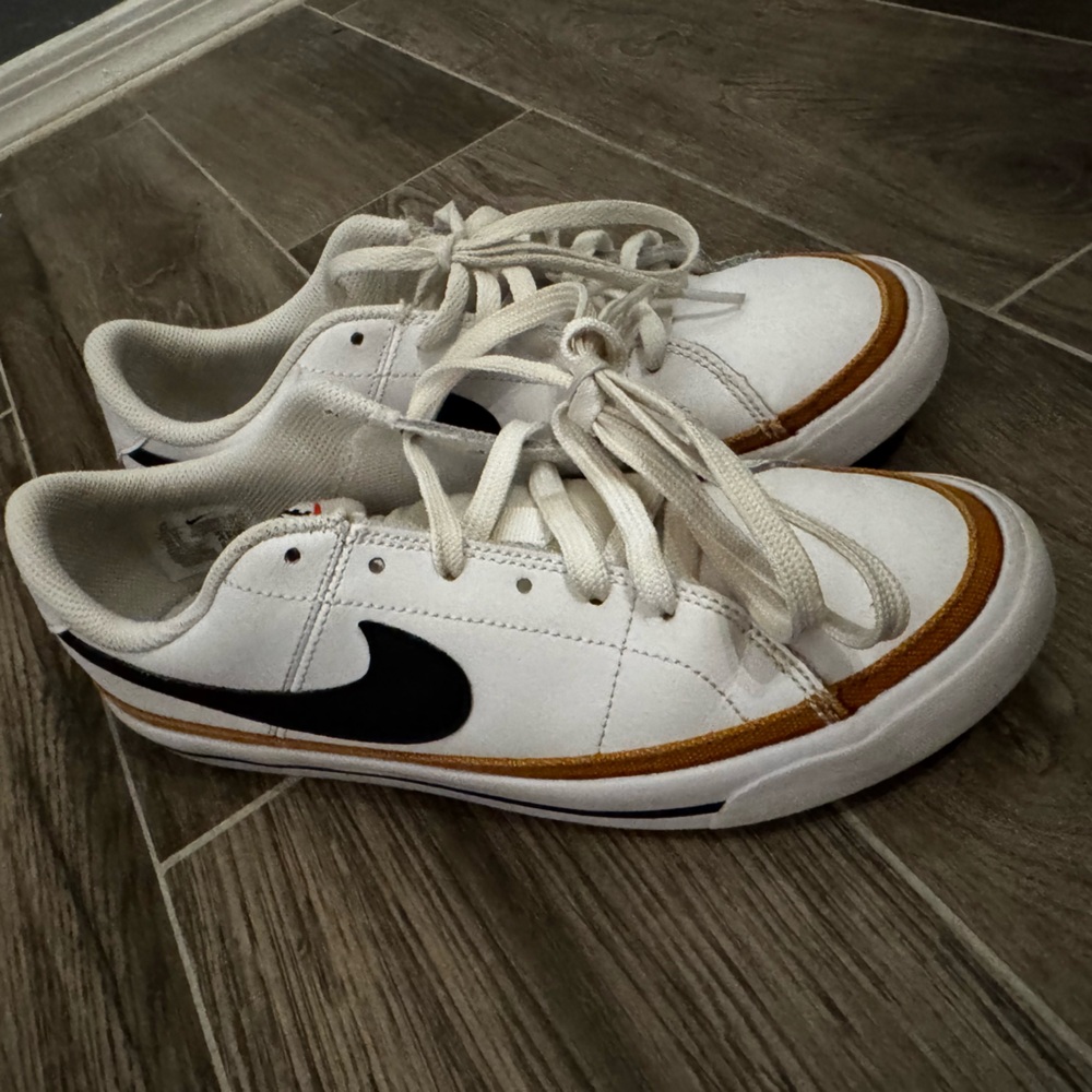 Nike White Sneakers with Black and Orange Details